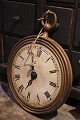 Decorative old wooden "clock" from a watchmaker