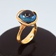 Ole Lynggaard; Lotus ring no. 3. in 18k gold, set with blue topaz and diamonds