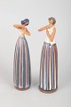 L'Art presents: Two figures by Cay Cedergren.