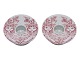 Bjørn Wiinblad Small red candle holder decorated with women's faces.
