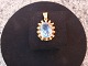 Pendant in 14 carat with beautiful light blue stone designed by O.W. from the 
1960s. 
5000m2 showroom.