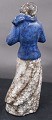 Michael Andersen Danish ceramics, Bornholm, in the series seasons. Young girl with blue jacket and muff, or winter