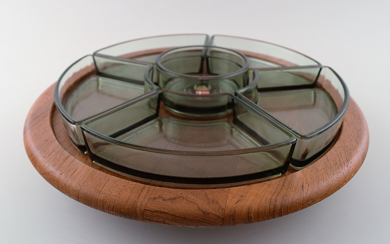 Flemming Digsmed, round cabaret dish on swivel base, teak with inserts of colored glass.
