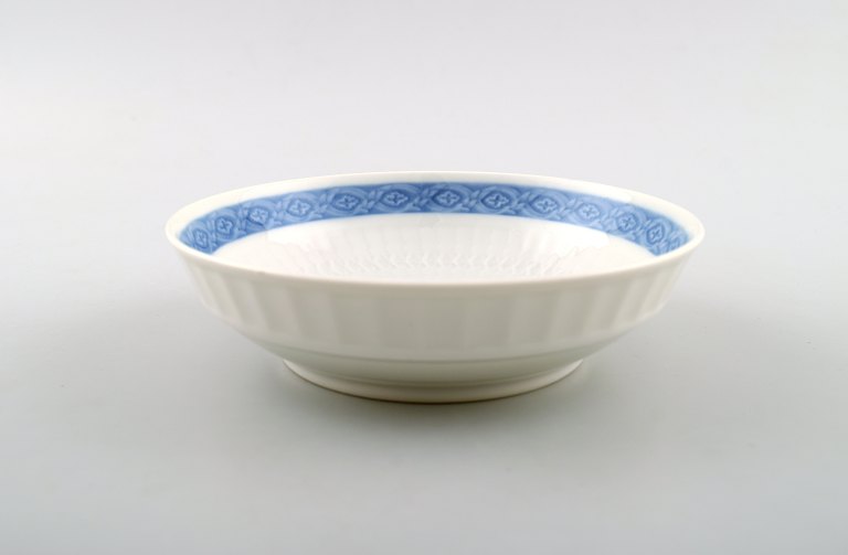 Royal Copenhagen bowl, Blue Fan. Designed by Arnold Krog in 1909. White porcelain frame with light blue edge.