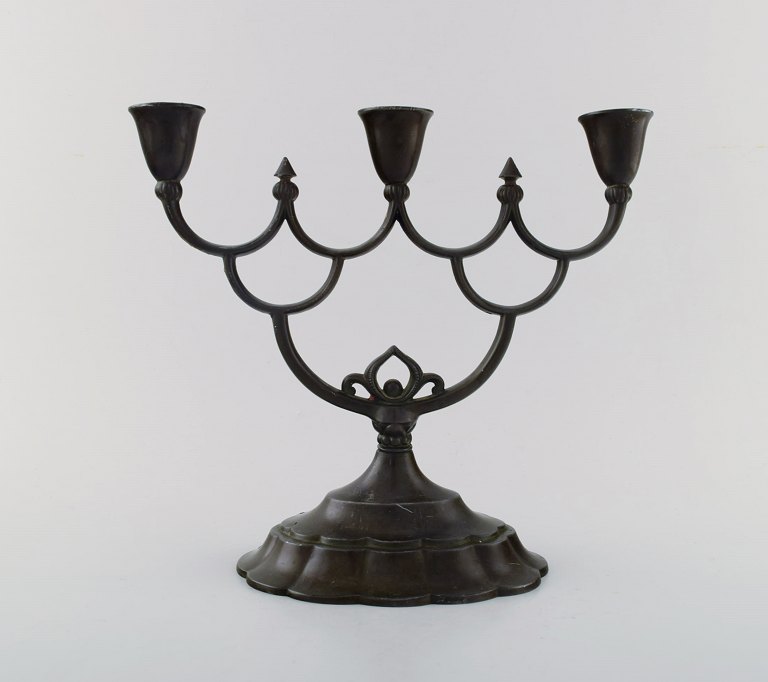 Just Andersen, early three-armed candlestick of patinated "disco" metal. Denmark 1930 s.