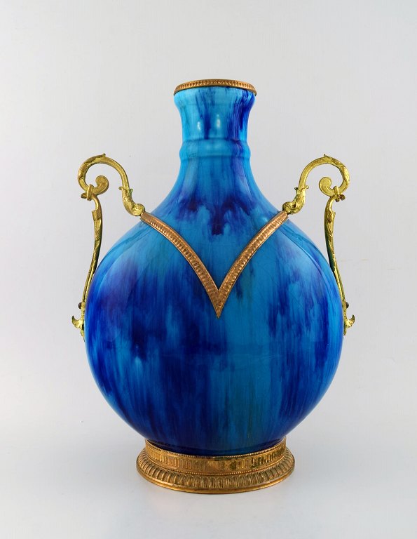 Sevres large vase in faience, hand painted in turquoise overglaze. Bronze mounting.