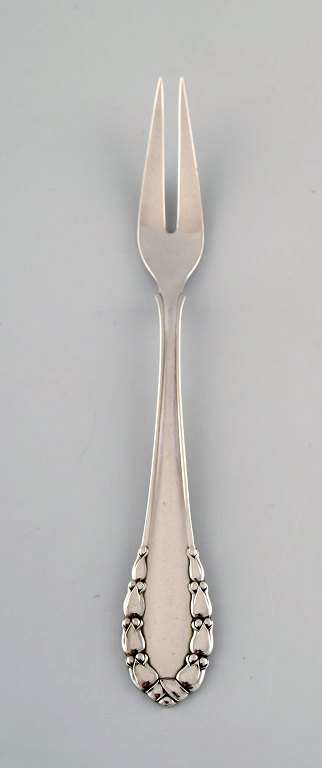 Georg Jensen "Lily of the valley" meat fork in sterling silver.
