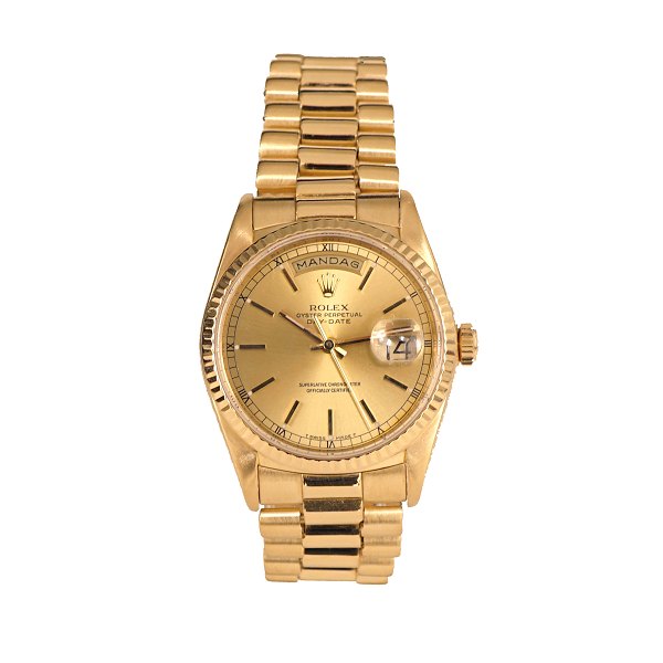 Rolex Day Date i 18kt guld. Solgt 1. gang hos autoriseret Rolexforhandler 
23.12.1989. Fuldt sæt med box, certifikat og meget tilbehør. Nyserviceret fra 
autoriseret Rolex værksted. Ref. 18238. D: 36mm