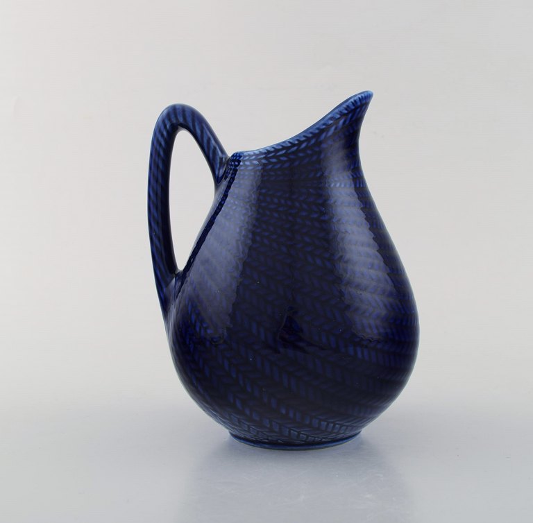 Hertha Bengtson for Rörstrand. "Blå eld" jug in porcelain. Beautiful deep blue glaze. 1960