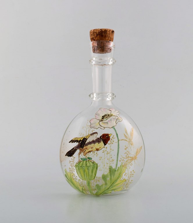 Legras, France. Carafe with hand painted enamel decorationin mouth-blown art glass. Birds and flowers. 1890s.