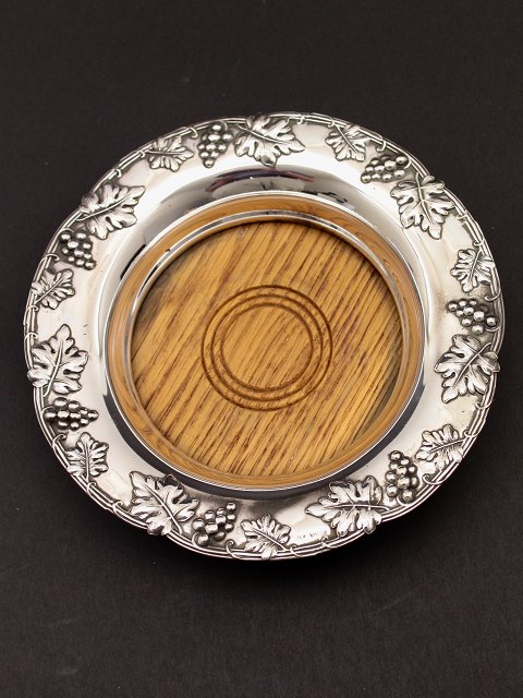 Silver-plated wine coaster with wooden base