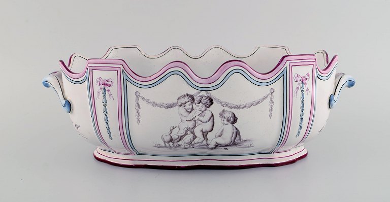 Emile Gallé for St. Clement, Nancy. Antique Monteith / punch bowl with handles in hand-painted faience decorated with young boys and ducks. Museum quality. 1870 / 80s.