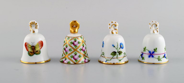 Four Herend table bells in hand-painted porcelain with flowers and gold decoration. 1980s.