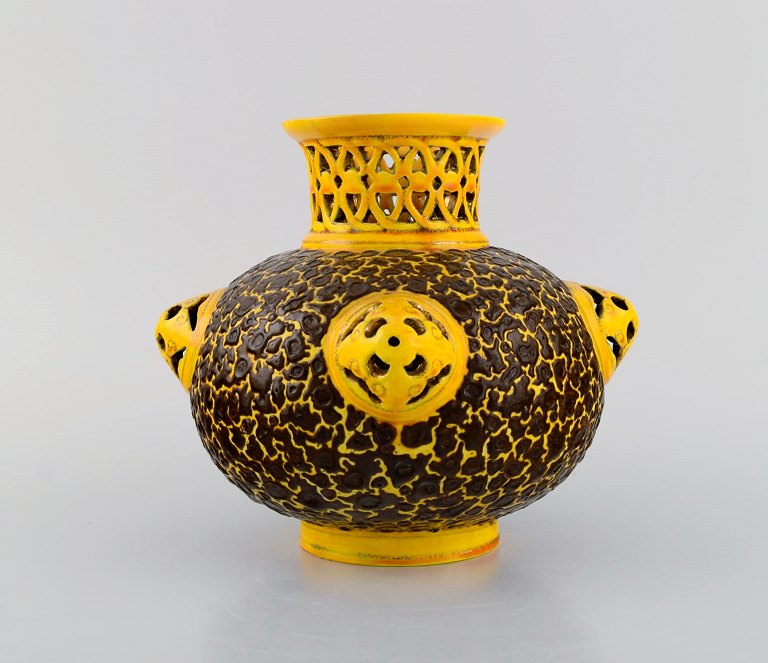 Antique Zsolnay vase in openwork glazed ceramics. Beautiful glaze in yellow and brown shades. Dated 1882-1885. Museum quality.
