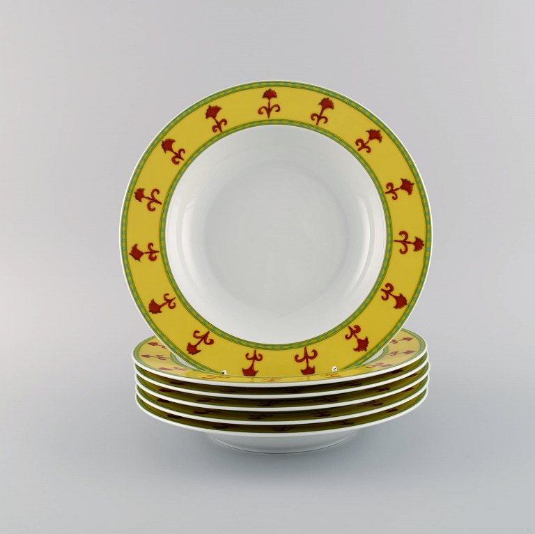 Paul Wunderlich for Rosenthal. Six Bokhara deep porcelain plates. Colorful design, late 20th century.