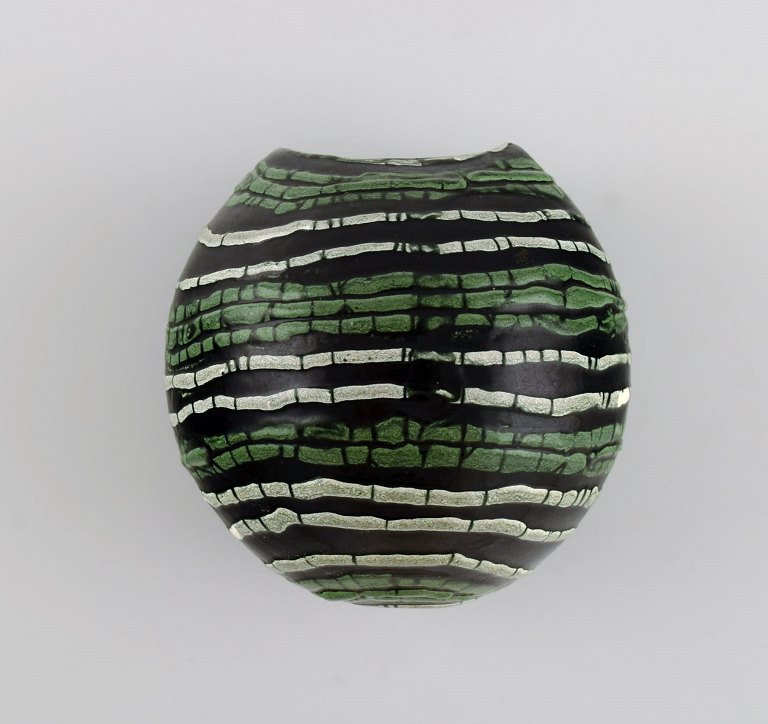 European studio ceramicist. Unique flowerpot for wall hanging in glazed ceramics. Green and white stripes on black background. 1960s / 70s.