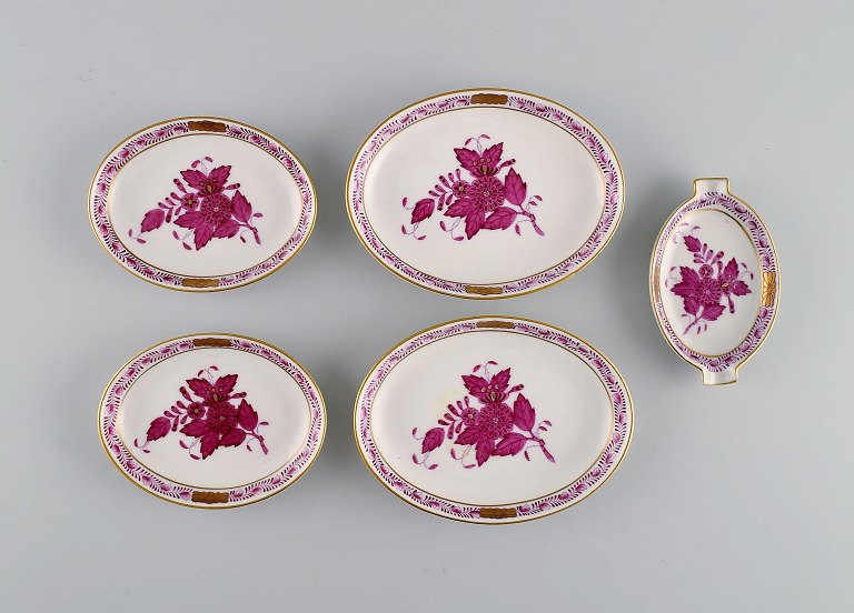 Five small Herend porcelain bowls with hand-painted purple flowers and gold decoration. Mid 20th century.