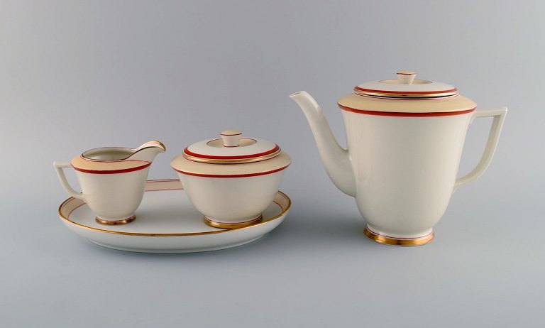 Christian Joachim for Royal Copenhagen. "The Spanish pattern". Coffee pot with sugar bowl and creamer on serving tray. Produced from 1931-1970.
