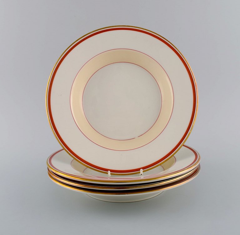 Christian Joachim for Royal Copenhagen. "The Spanish pattern". Four deep plates in hand-painted porcelain. Produced from 1931-1970.