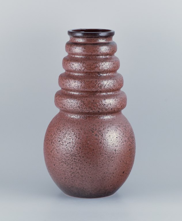 West Germany, floor vase in ceramic with glaze in shades of brown.