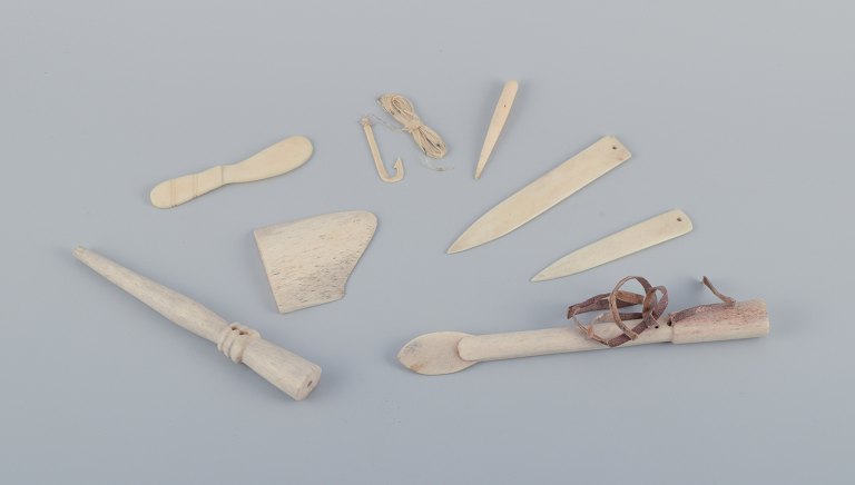 Greenlandica, a collection of various bone tools, comprising seven pieces in total.