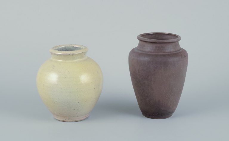 Kuch and Elly Kuch (1929-2008) and Wilhelm Kuch (1925-2022). Two unique ceramic vases. One vase in matte glaze with brownish tones.The other vase with glaze in yellow and pink hues.