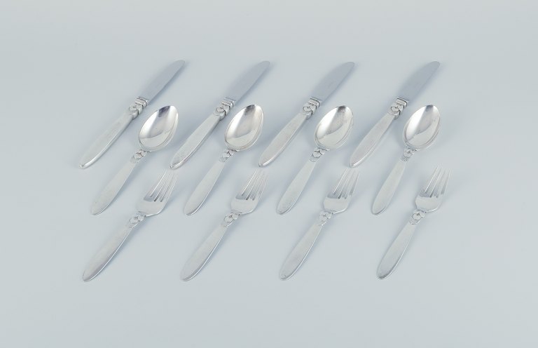Georg Jensen Cactus. A four-person lunch set in sterling silver.
Comprising four long-handled lunch knives, four lunch forks, and four 
tablespoons.