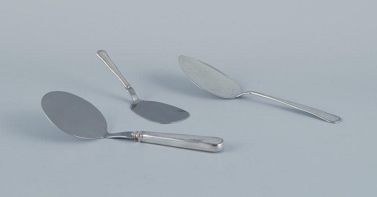 Cohr and other Danish silversmiths. Three "Old Danish" serving ladles in 830 silver and stainless steel.