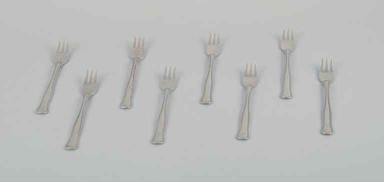 Georg Jensen. Et sæt på otte Dobbeltriflet kagegafler i sterlingsølv.