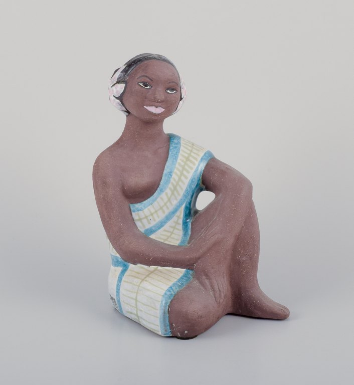 Mari Simmulson (1911-2000), for Upsala-Ekeby, Sweden.Rare ceramic figurine of a half-naked Tahitian woman.