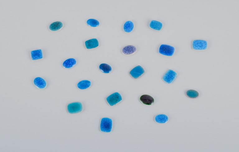 Ole Bjørn Krüger (1922-2007), Danish sculptor and ceramicist.Twenty unique brooches in glazed stoneware in blue and turquoise shades.
