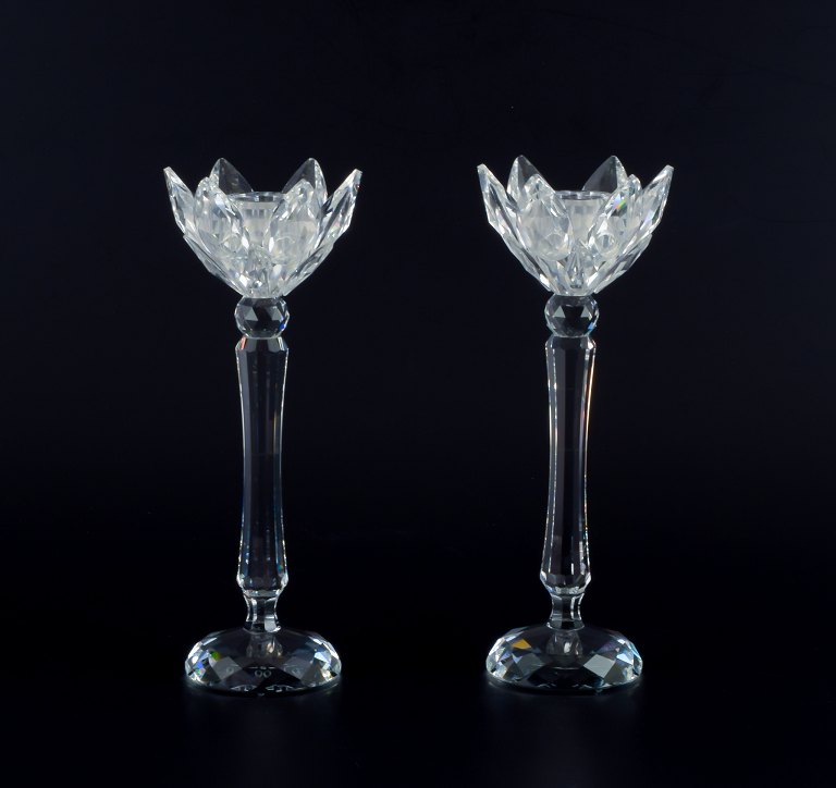 Swarovski, Austria. A pair of candle holders in faceted crystal.