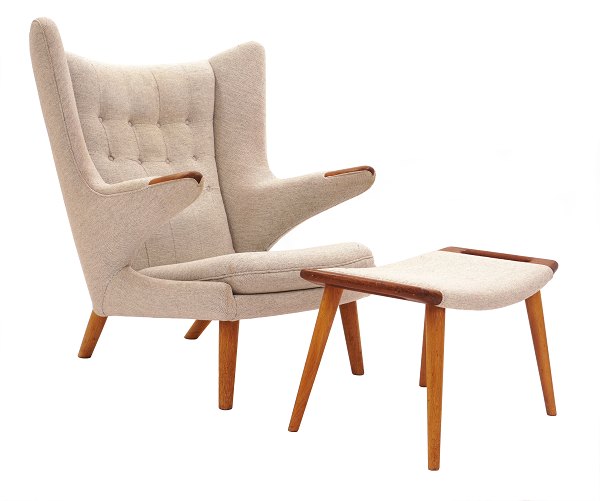Hans J. Wegner “Papa Bear”. Wingback teak and oak easy chair with matching 
stool. AP 19 and AP 29