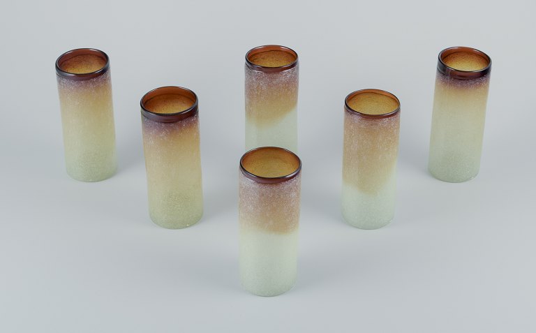 Napoleone Martinuzzi, Venini, Murano.
A set of six tall glasses in art glass.