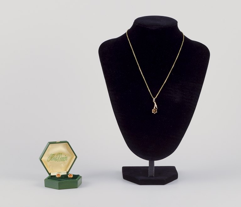 Flora Danica Jewellery, produced at Eggert. 
“Lily of the Valley” necklace and a pair of stud earrings.