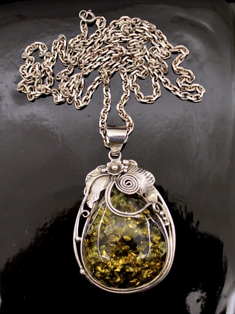 Sterling silver vintage pendant with amber