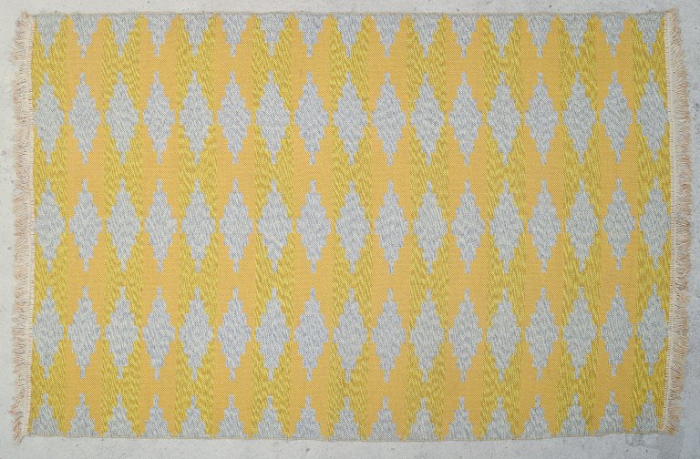 Svensk tekstildesigner.Håndvævet tæppe i uld. Rölakan teknik. Dobbeltvævet