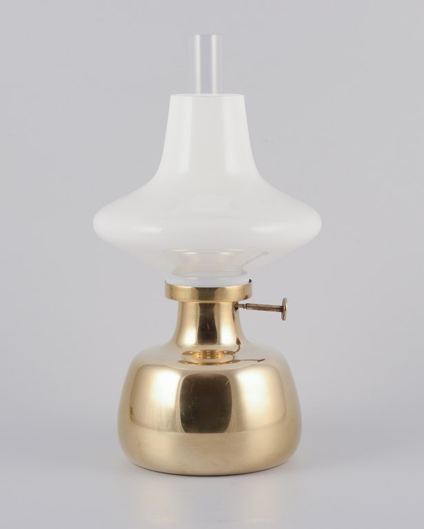 Henning Koppel for Louis Poulsen.
Petronella oil lamp in brass with opal glass shade.