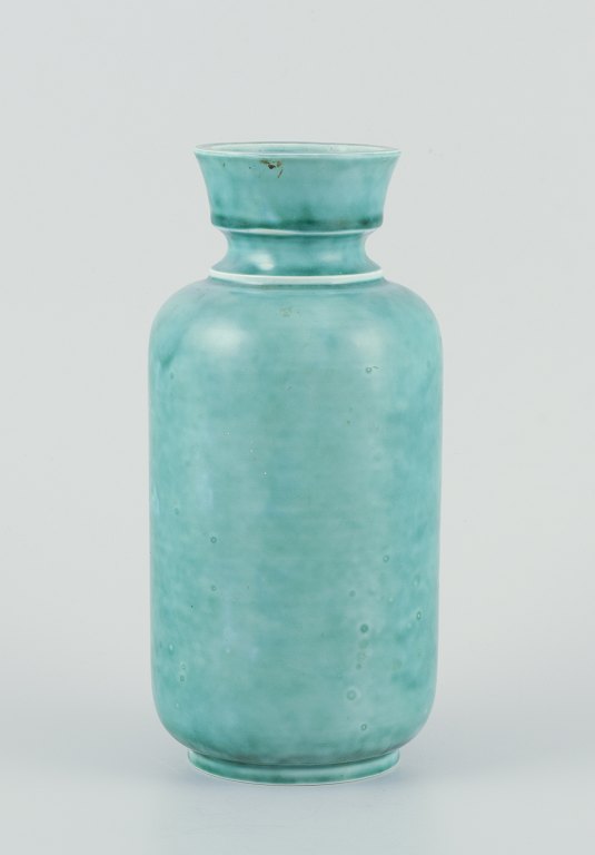 Wilhelm Kåge for Gustavsberg, large stoneware vase.
“Argenta” series. Hand-turned, glazed in green tones.