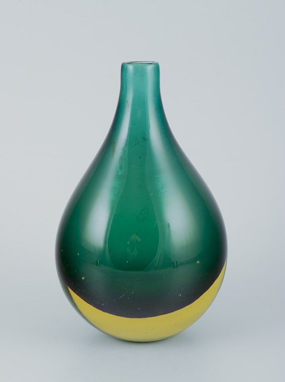 Murano, Italy.
Vase in green art glass. Chubby shape.