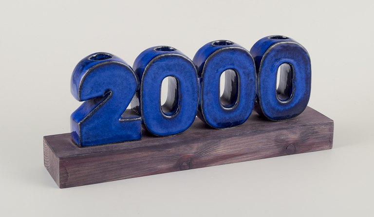 Lisa Larson for K-Studion, Gustavsberg, Sweden.‘Millenium 2000’ stoneware candleholder for four candles.
