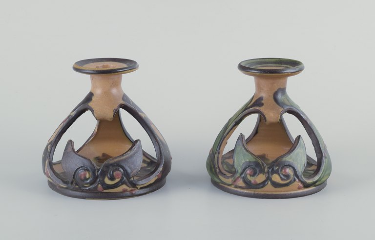 Kähler, Denmark. Two Art Nouveau ceramic candlesticks.
