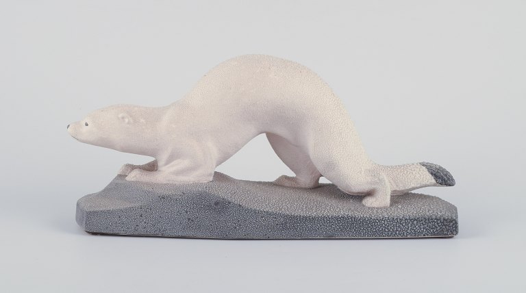 Sevres, France. Sculpture of a mink in earthenware.