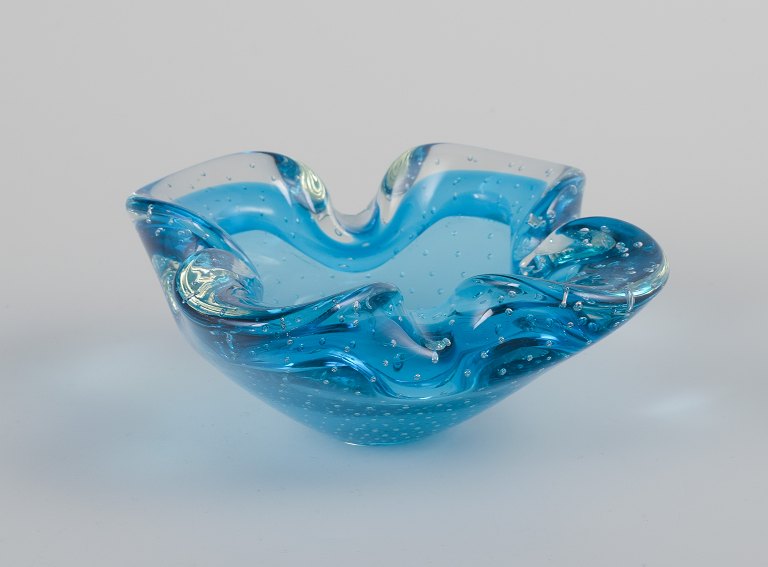 Archimede Seguso for Murano, Italy.Bowl in azure blue art glass with clear rim.