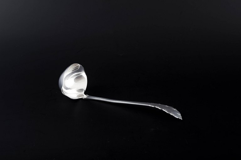 Georg Jensen, Denmark
Sauce spoon in the "Lily of the Valley" pattern.