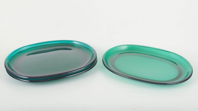 Josef Frank for Svenskt Tenn
Three oval lobster plates in emerald green glass.
