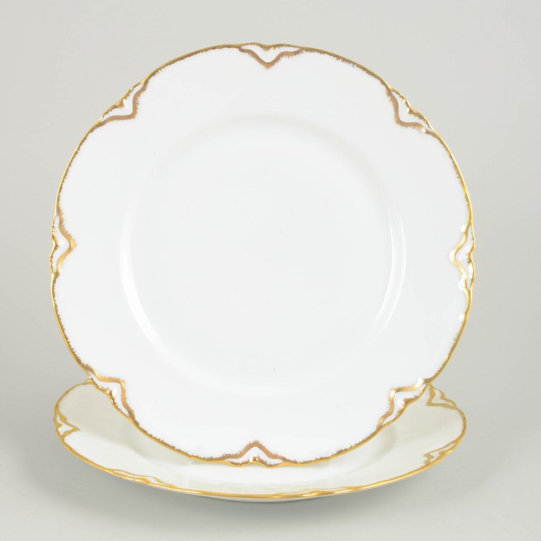Haviland/Limoges, set of two porcelain dinner plates.