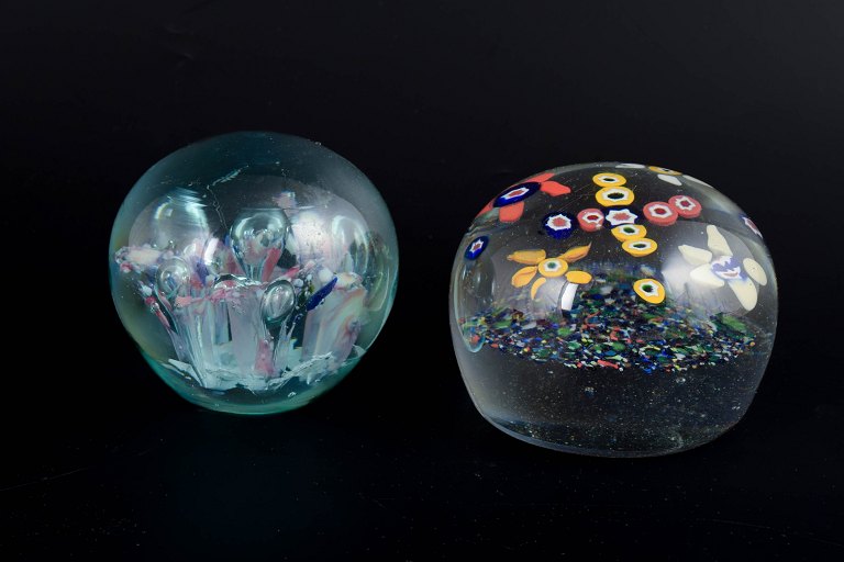 Swedish glass maker, two paperweights.
