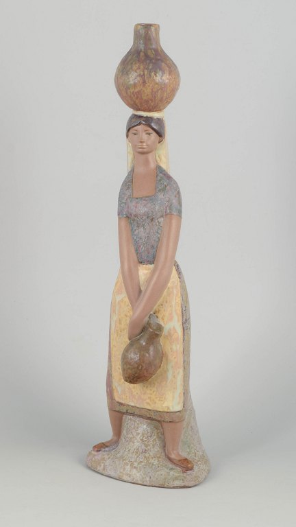 Lladró figurine, woman with vessels.