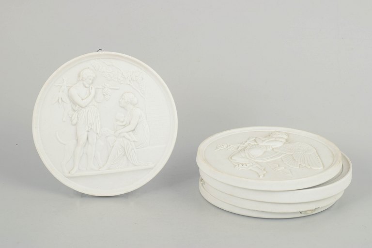 Bing & Grøndahl, set of five biscuit wall plaques after Thorvaldsen.